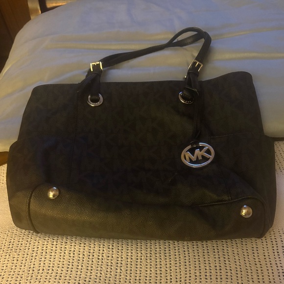 Michael Kors Handbags - Michael Kors Black Shoulder Bag. Not New.. only worn about 2 times..